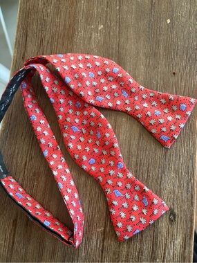 Hermes bow tie elephants palm trees coral